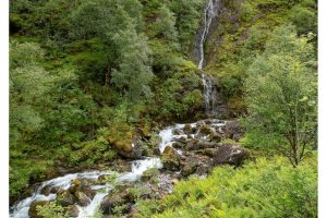 Wanderung in einem Seitental des Glencoe Valley, Schottland (OM-1)
